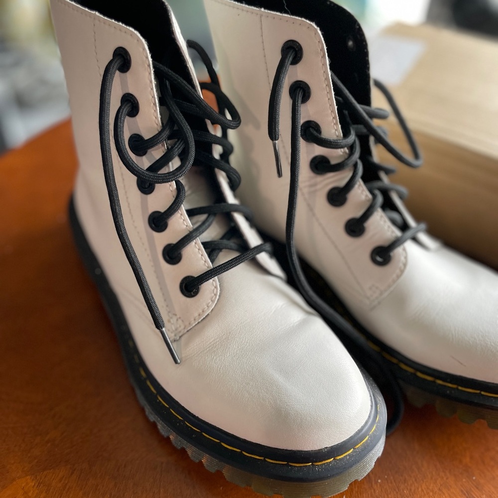 Dr. Martens white Luana Boots with Black Laces and clear rubber sole.